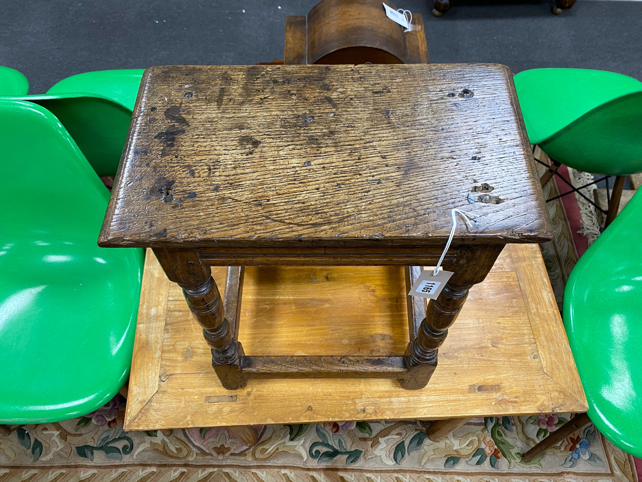 A 17th century style oak joint stool, modified, height 54cm